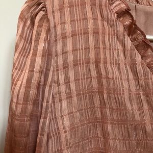 Glittery blush pink dress.